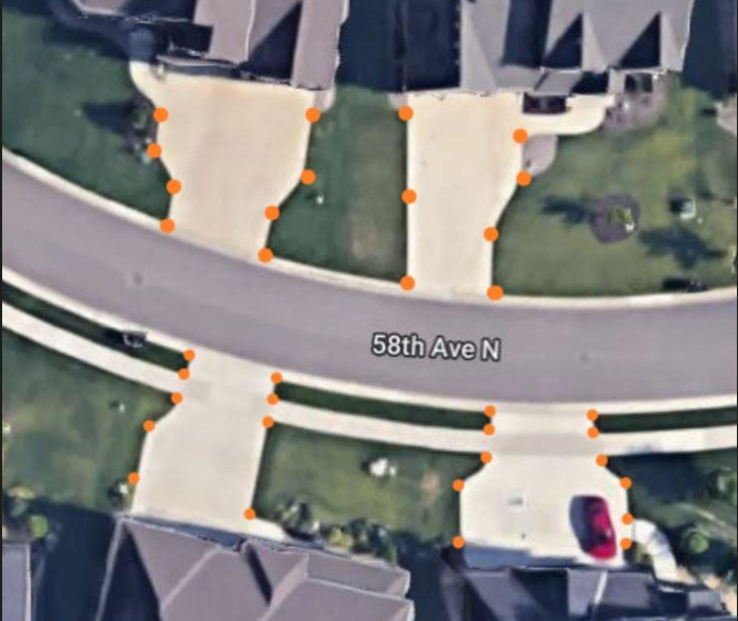 Aerial view of driveway markers spaced along driveway edges and corners